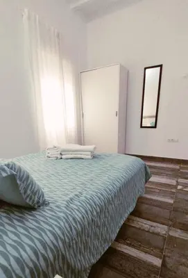 Cama o camas de una habitación en Modernos Apartamentos en Ciudad Jardín Córdoba
