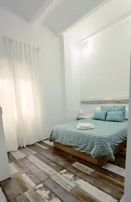 Cama o camas de una habitación en Modernos Apartamentos en Ciudad Jardín Córdoba