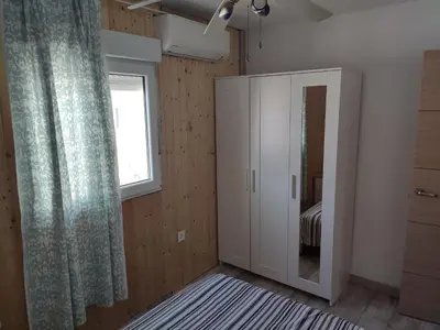 Cama o camas de una habitación en Luminoso y acogedor apartamento junto a la Macarena de Sevilla