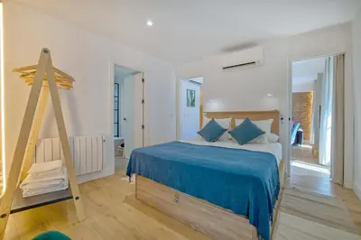 Cama o camas de una habitación en Victoria Suites Apartments