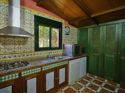 Una cocina o zona de cocina en VILLA BASILIO