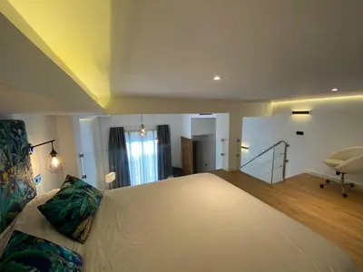 Cama o camas de una habitación en Loft Laura Nervión