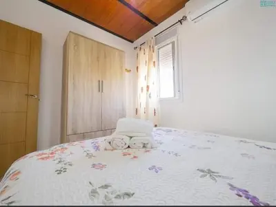 Cama o camas de una habitación en EL CHASCÁ