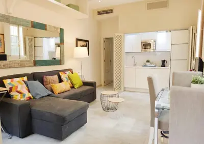 Una cocina o zona de cocina en HomeySeville-Bright Apartment at Santa Cruz 4 pax, Parking Optional