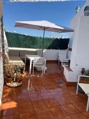 Un balcón o terraza de Duplex with terrace Santa Rufina