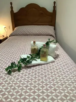 Cama o camas de una habitación en El Aroma del Dulce