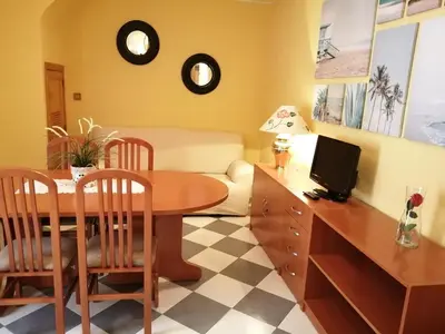 Una televisión o centro de entretenimiento en Casa Rural El Patio