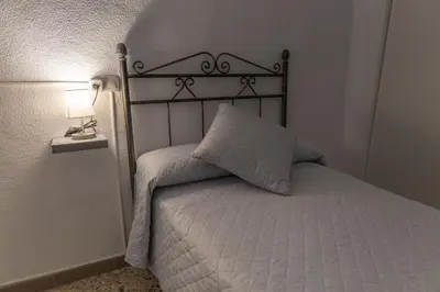 Cama o camas de una habitación en Casa Villanueva de Córdoba