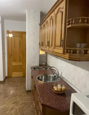 Una cocina o zona de cocina en Apartamentos Coronichi