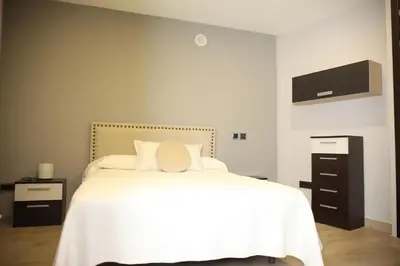 Cama o camas de una habitación en Caño