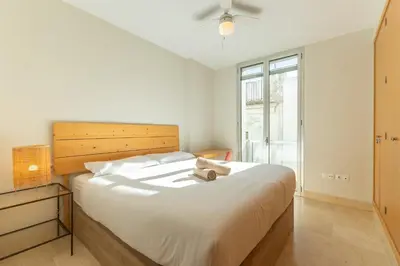 Cama o camas de una habitación en Tentudia Charming Apartments with Private Roof-Top or Patio in San Bernardo By OCityzen