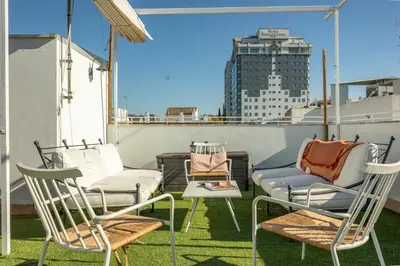 Un balcón o terraza de Tentudia Charming Apartments with Private Roof-Top or Patio in San Bernardo By OCityzen