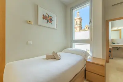 Cama o camas de una habitación en Tentudia Charming Apartments with Private Roof-Top or Patio in San Bernardo By OCityzen