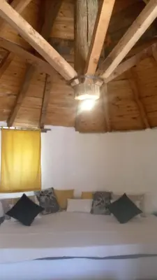 Cama o camas de una habitación en casa hobbit Puente Genil