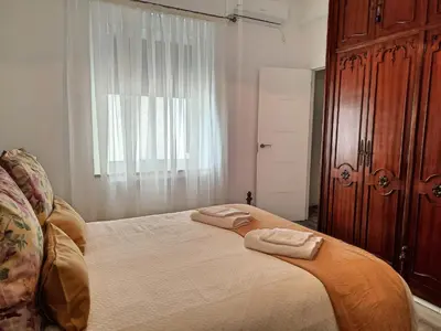 Cama o camas de una habitación en Eduardo Lucena 5, Casco Histórico