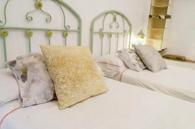 Cama o camas de una habitación en APARTAMENTO CAMINO MOZARABE