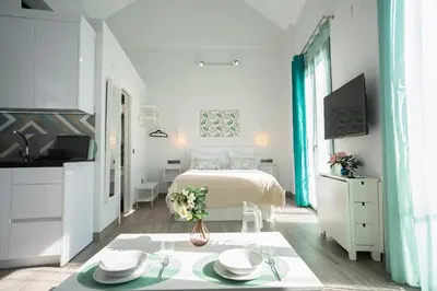 Cama o camas de una habitación en EM21 Apartamentos