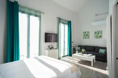 Cama o camas de una habitación en EM21 Apartamentos