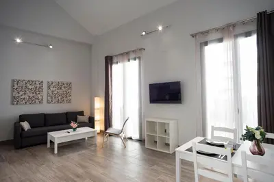 Una televisión o centro de entretenimiento en EM21 Apartamentos