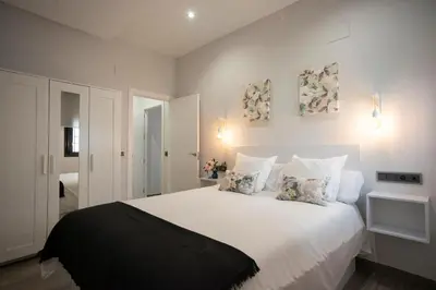 Cama o camas de una habitación en EM21 Apartamentos