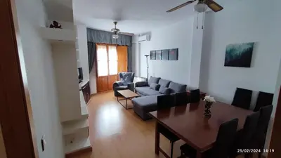 Una televisión o centro de entretenimiento en Dúplex San Lorenzo 2 PARKING GRATUITOS Y PISCINA