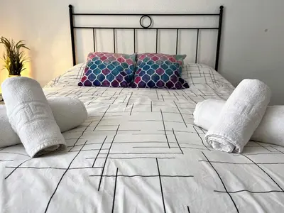 Cama o camas de una habitación en Apartamento Córdoba Palace