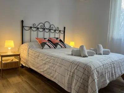Cama o camas de una habitación en Apartamento Córdoba Palace