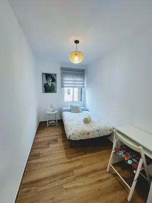 Cama o camas de una habitación en Sol Centro Apartment B