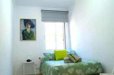Cama o camas de una habitación en Sol Centro Apartment B