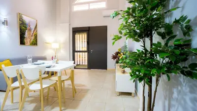 Zona de estar de RentalSevilla Escuelas Pías