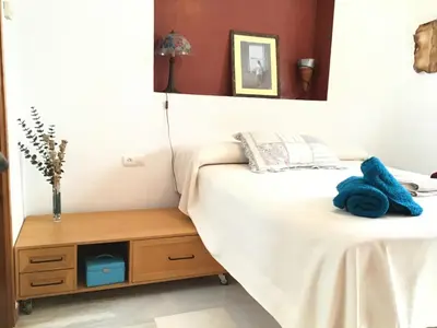 Cama o camas de una habitación en PRECIOSO DUPLEX EN PLENA JUDERIA