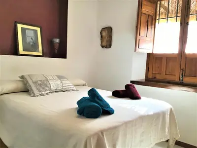 Cama o camas de una habitación en PRECIOSO DUPLEX EN PLENA JUDERIA