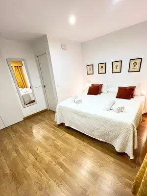 Cama o camas de una habitación en Apartamento centro ciudad con parking incluido