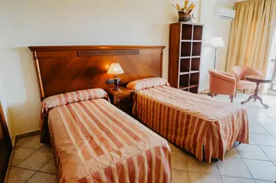 Cama o camas de una habitación en Hotel Hacienda Don Manuel