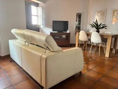 Una televisión o centro de entretenimiento en Apartamento San Fernando
