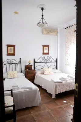 Cama o camas de una habitación en Casa Rural LA ENCINA
