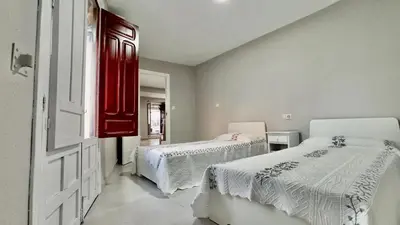 Cama o camas de una habitación en Vivienda Paseo 9 Baeza
