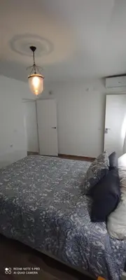 Cama o camas de una habitación en ATICO AMPLIO Y LUMINOSO