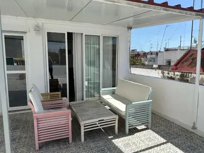 Un balcón o terraza de ATICO AMPLIO Y LUMINOSO