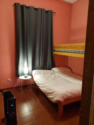 Cama o camas de una habitación en Casa Rural ESTACIÓN DEL SOLDADO