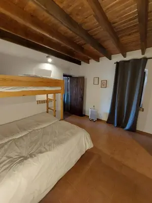 Cama o camas de una habitación en Casa Rural del GUARDAGUJAS
