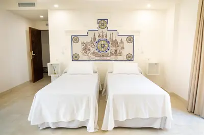 Cama o camas de una habitación en Posada Boutique El Gallo Morón