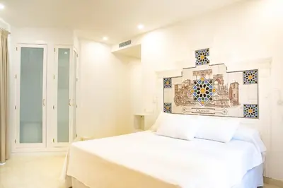 Cama o camas de una habitación en Posada Boutique El Gallo Morón