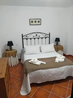 Cama o camas de una habitación en Alojamiento Rural Los Barrosos