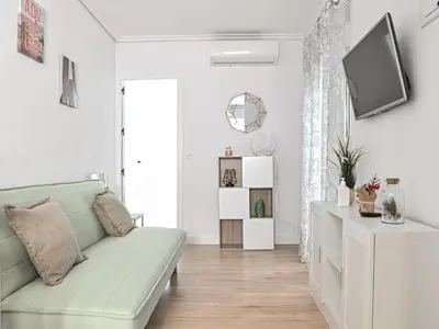 Una televisión o centro de entretenimiento en Apartamento La Pastora