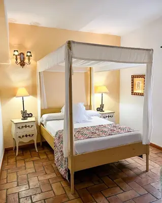 Cama o camas de una habitación en Hostal Servilia