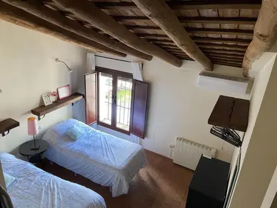 Cama o camas de una habitación en Dúplex con piscina en centro Cazalla