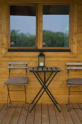 Un balcón o terraza de Hermoso Bungalow de madera