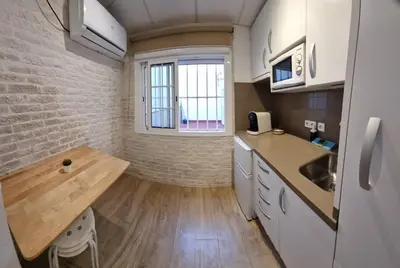 Una cocina o zona de cocina en Mini Estudio Sevilla Centro