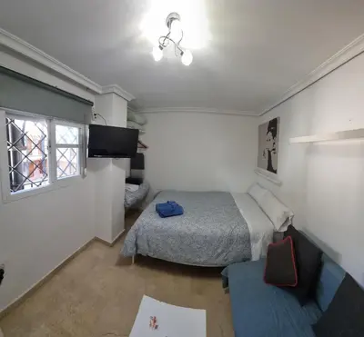Cama o camas de una habitación en Estudio Sevilla Centro